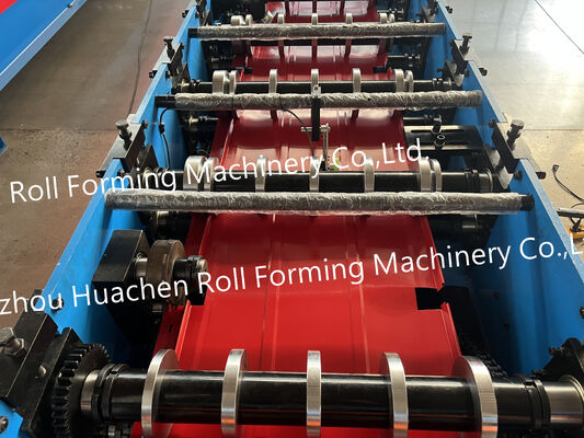 Trilobal metal rolling machine for forming wall panels and roof panels into a trapezoidal shape